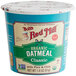 A Bob's Red Mill blue and white container of organic classic oatmeal.