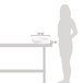 A woman standing next to a table with a Hall China ivory chafing dish on it.