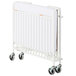 A white Foundations StowAway EasyRoll folding crib with wheels.