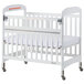 Foundations 2542120 Serenity SafeReach 24" x 38" White Compact Clearview Wood Crib with Safety Access Gate, Adjustable Mattress Board, and 3" InfaPure Mattress Main Thumbnail 1