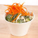 An Arcoroc Ludico deep bowl filled with broccoli and carrots.
