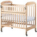 Foundations 2543040 Serenity SafeReach 24" x 38" Natural Compact Clearview / Mirror Wood Crib with Safety Access Gate, Adjustable Mattress Board, and 3" InfaPure Mattress Main Thumbnail 3