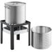 A Backyard Pro aluminum seafood boiler and steamer kit on a stand with a silver metal basket.