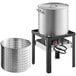 A Backyard Pro aluminum seafood boiler and steamer kit on a stand with a metal basket.