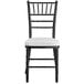 A Lancaster Table & Seating black wood Chiavari chair with white cushion.