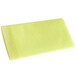 A yellow paper towel with a textured pattern on a white background.