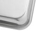 A close up of a Baker's Mark heavy-duty aluminum bun sheet pan with open bead rim.