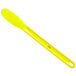 A Choice neon yellow sandwich spreader with a smooth polypropylene handle.