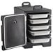 A black metal CaterGator food pan carrier with Vigor stainless steel pans and lids inside.