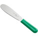 A stainless steel sandwich spreader with a green polypropylene handle.