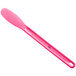 A Choice neon pink sandwich spreader with a handle.