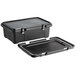 A black plastic CaterGator food pan carrier with a lid on a table.