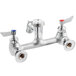 A silver Waterloo wall-mounted mop sink faucet with red and blue knobs.