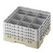 A beige plastic Cambro glass rack with 9 compartments and extenders.