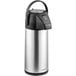 A silver and black Acopa stainless steel airpot with a push button lid.