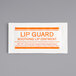 A white and orange Medique Lip Guard packet with red text.