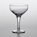A close-up of a clear Pasabahce Moda wine glass with a stem.