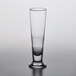 A clear Pasabahce footed pilsner glass.