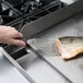 Mercer Culinary M18390 Hell's Handle® High Heat 9" x 4" Fish / Egg Turner / Spatula Main Thumbnail 1