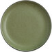 A close up of a moss green Acopa coupe plate with a brown rim.