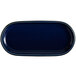 An Acopa Azora Blue stoneware oblong coupe platter on a counter.