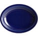 An oval deep sea cobalt blue plate with blue lines.