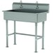 An Advance Tabco stainless steel multi-station hand sink with tubular legs and 2 electronic faucets.