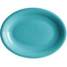 An oval Caribbean turquoise stoneware coupe platter with a rim.