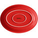 An Acopa Capri oval stoneware coupe platter in passion fruit red with a white border.