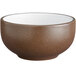 A brown Acopa stoneware bowl with a white rim.
