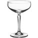 An Acopa Empire coupe glass with a stem on a white background.