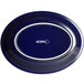 An Acopa Capri deep sea cobalt oval platter with white text on it.