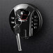 A Barska black steel surface-mount biometric security safe with a key in the keypad lock.