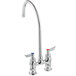 A silver Waterloo deck-mount faucet with two handles and a gooseneck spout.