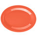 An orange oval melamine platter with a white background.