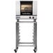 A silver and black Moffat convection oven on wheels.