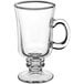 An Acopa Select clear glass Irish coffee mug with a handle.