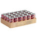 A cardboard box of Texsun Pink Grapefruit Juice cans.