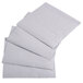 A stack of four dove gray Hoffmaster beverage napkins.