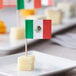 A Mexican flag on a Choice toothpick with cubes of cheese and crackers.