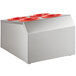 A white box with red perforated plastic cups on top of a silver flatware organizer.