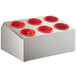 A silver flatware organizer with red perforated cups inside.
