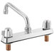 A Regency chrome deck-mount faucet with an 8" swing spout and 8" centers and two knobs.