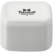 A white Tuxton China cube with a black logo on the lid.