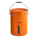 An orange utility pail with a handle.