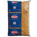 A bag of Barilla Penne Rigate pasta.