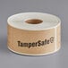 A roll of Kraft paper labels with black text reading "TamperSafe"