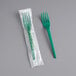 A package of EcoChoice green wrapped plastic forks.