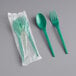 A green EcoChoice CPLA spoon and fork in a plastic bag.