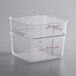 A clear square plastic Carlisle food storage container with measurements in pink.